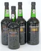 Four bottles of Cockburn's Special Reserve Port, three 1 litre 20% vol and one 750ml 20% vol