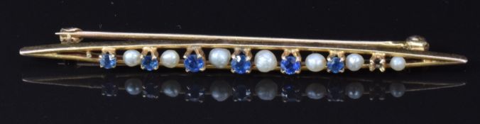A 10k gold brooch set with alternating sapphires and pearls, 5.5g, 2.7g