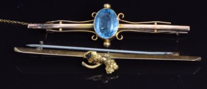 A 9ct gold brooch set with paste (3g) and a yellow metal brooch (3.7g)