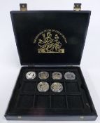 Six silver proof commemorative crown sized coins in a collector's case