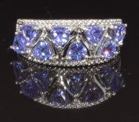 A 9ct white gold ring set with tanzanites and diamonds, size S, 3.5g