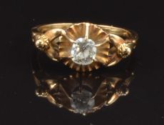 A c1900 yellow metal ring set with a European old cut diamond of approximately 0.35ct, size N, 2.9g