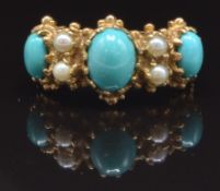 A 9ct gold ring set with seed pearls and faux turquoise, size M, 4.1g