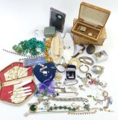 A collection of jewellery including a silver bangle set with an amethyst cabochon, Sekonda watch,