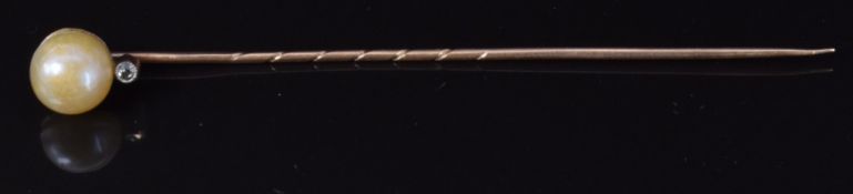 Victorian stick pin set with a rose cut diamond and pearl, 6.5cm, 1.3g