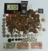 An amateur collection of UK and overseas coinage, banknotes and modern crowns, including a bronze