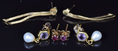 Three pairs of 9ct gold earrings, one pair set with a ruby and the other a pearl and amethyst, 1.8g