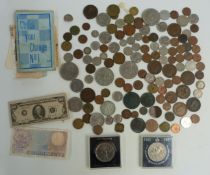 A small amateur collection of coins, small silver content, UK and overseas, in a vintage money box