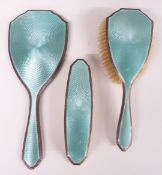 George V Art Deco turquoise guilloché enamel set silver dressing table set comprising hand mirror