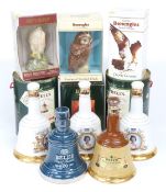 Eleven Bell's, Beneagles and Whyte and Mackay decanters in boxes, including 1989/92 Christmas