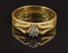 An 18ct gold ring set with a diamond, size M, 3.7g