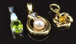 Three pendants comprising 9ct white gold set with an opal and peridot, 9ct gold set with a pearl and