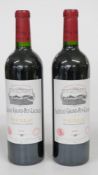 Two bottles of Chateau Grand-Puy-Lacoste 2000 Pauillac Grand Cru Classé red wine 75cl 13% vol.