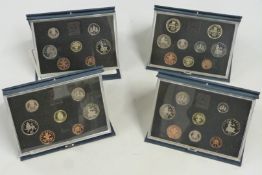 Royal Mint UK proof coin sets  for 1987, 1988, 1989 and 1990, in deluxe cases with certificates