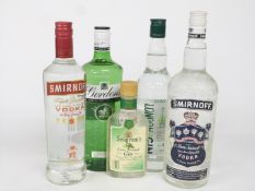 Three bottles of gin comprising Gordon's Dry London Gin 37.5%, Tesco London Dry Gin 37.5% vol,