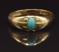 Edwardian 18ct gold ring set with an oval turquoise cabochon, Birmingham 1901, size Q, 4.1g