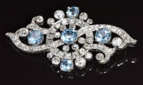 Belle Époque platinum brooch set with five round cut aquamarines and transitional cut diamonds, 5.