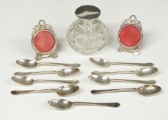 Nine hallmarked silver teaspoons, weight 114g, hallmarked silver mounted cut glass bottle, height