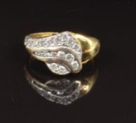 An 18ct gold ring set with cubic zirconia, size Q, 3.8g