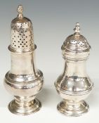 Two Georgian hallmarked silver peppers or small casters, one London 1743, maker David Field the