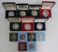 Seven cased silver proof Tokelau one Tala coins, Elizabeth II, includes pineapple, fishing bucket