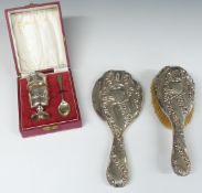 Cased hallmarked silver egg cup, napkin ring and spoon set, weight 110g, together with a