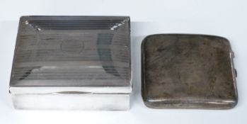 Hallmarked silver cigarette box with engraved decoration to lid, width 11cm, together with a