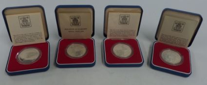 Four cased Royal Mint Royal Commemorative silver crowns for 1977 and 1978 Guernsey, Gibraltar,