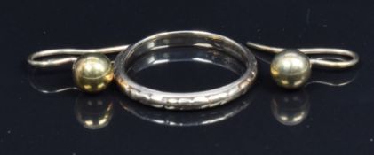A 9ct gold wedding band and a pair of earrings in a Victorian box, 1.8g