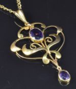 Edwardian 9ct gold pendant set with amethysts on a 9ct gold chain, 6g, length 58cm