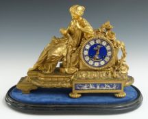 Vincenti & Cie 19thC French figural brass ormolu mantel clock, the female seated figure dressed in