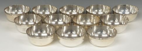 Set of 12 Spanish white metal bowls with shaped rims, Spanish 915 grade silver marks to bases with