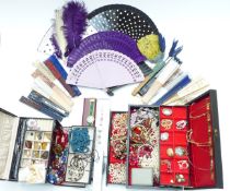A collection of costume jewellery including beads, brooches, fans, etc