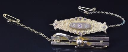 Victorian 9ct gold brooch set with a ruby and diamonds, verso a glass compartment and a 9ct rose