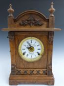 Oak cased shelf / mantel clock, Fattorini & Sons, Bradford to enamel Roman dial, the movement
