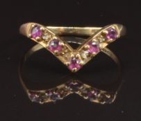A 9ct gold ring set with rubies and diamonds, size L, 1.5g