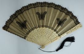 A c1900 pierced bone fan set with cut steel studs, length 26cm
