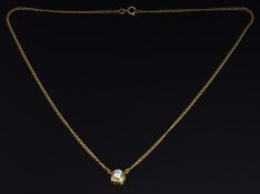 An 18ct gold necklace set with a round cut diamond of approximately 0.45ct, length 40cm, 5.8g