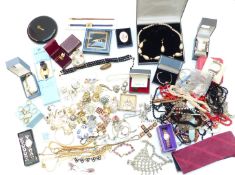 A large collection of costume jewellery including watches, carnelian agate necklace, brooches