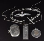 A collection of silver jewellery including ingot, fob, Albert, vesta and RAF brooch
