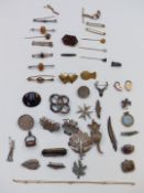 A collection of jewellery including Victorian locket, seal fob, brooches including filigree,