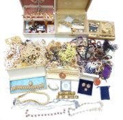 A collection of costume jewellery including earrings, chains, filigree and diamanté necklaces,
