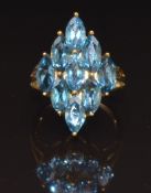 A 9ct gold ring set with marquise cut blue topaz, size N, 4.4g