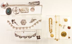 A collection of brooches including silver filigree, silver, Jewelcraft necklace, etc