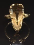 A 9ct gold ring set with a pear cut smoky quartz, size M, 4.2g