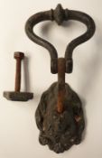 Victorian cast iron lion mask door knocker, H22cm, together with striker block
