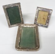 Three small hallmarked silver photograph frames including one with oak easel back, Birmingham