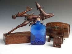 Art Deco carved wooden figurine of a lady riding a stag, on adzed oak base, length 40cm,