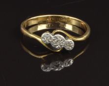 An 18ct gold ring set with diamonds in platinum setting, size N, 2.1g