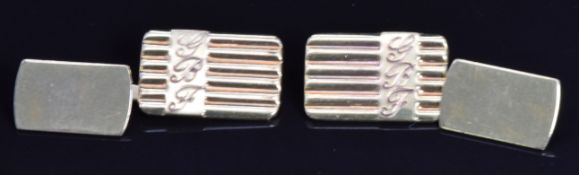 A pair of 9ct gold cufflinks with ridged decoration, 4.3g
